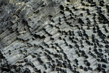 Basalt volcanic rock formations in Reinisfjara beach near Vik in northern Iceland
