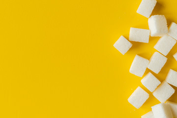 sugar cube on yellow background isolated design mockup b