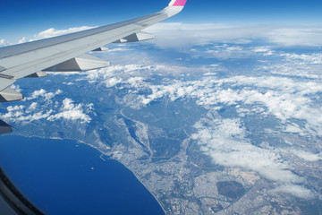 Naklejka na ściany i meble view from the plane window.Airplane wing