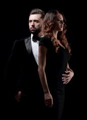 Hot girl in a black dress next to a businessman