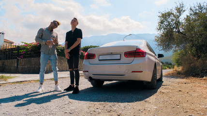 The young guys in the car.Going on vacation
