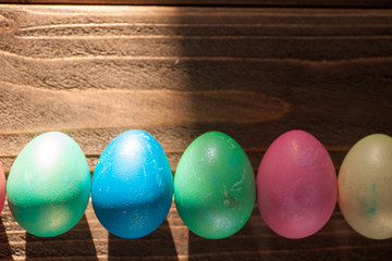 Easter eggs on wooden planks