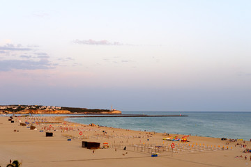 The end of the day in Algarve Beach at Summer time.