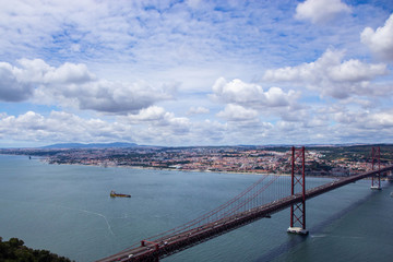 Naklejka premium Panoramic view of Ponte 25 de Abril, long bridge in Lisbon