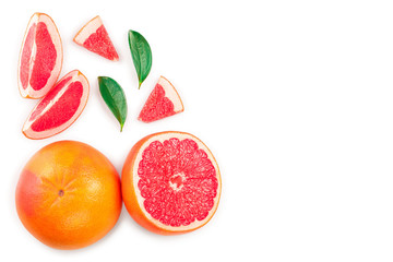 Grapefruit and slices with leaves isolated on white background with copy space for your text. Top view. Flat lay pattern