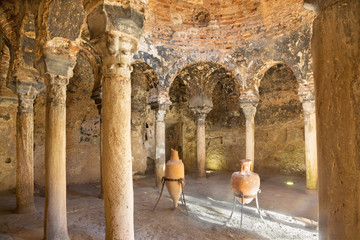 PALMA DE MALLORCA, SPAIN - JANUARY 27, 2019: The little medieval bathhouse - Banos arabes with the typically archs. © Renáta Sedmáková