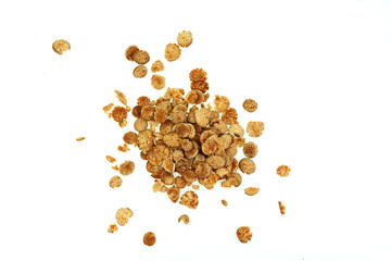Organic soy flakes isolated on white background.