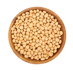 Dry raw organic chickpeas in wooden bowl isolated on white background. Top view