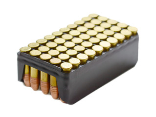 Scattering of small caliber cartridges isolated on white. 