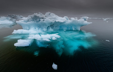 Greenland iceberg in Disko Bay - transparent ice roots