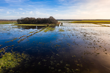 A field of farmland flooded by water near the city of Den Bosch, Noord-Brabant, Netherlands.