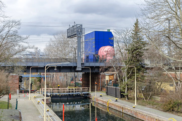  Landwehr Canal with its Lower Lock and a pink pipe of the circulating channel  in Berlin, Germany