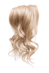 Naklejka premium Long wavy blond hair isolated on white background