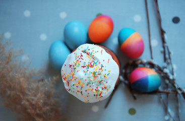 Easter composition. Baking and eggs in blue tones. Selective focus. Greeting card concept