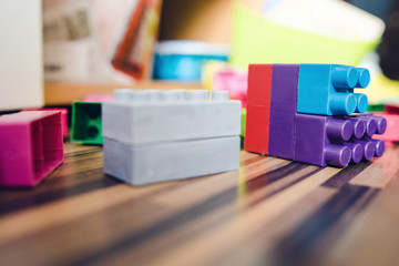 Low Angle View on Cube Brick construction Toy On The Floor