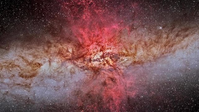 Turbulent cosmic clouds in starburst cigar galaxy rotating in outer space. Contains public domain image by Nasa