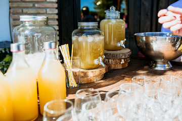 Fototapeta na wymiar lemon juice in jug and glasses