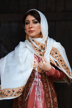 Portrait Of Beautiful middle eastern woman wearing traditional dress