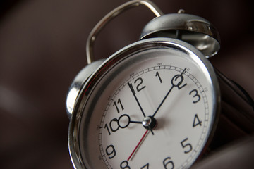 Old fashion clock on dark background