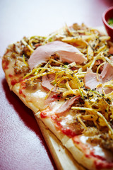Ham and marinated spring onion pizza