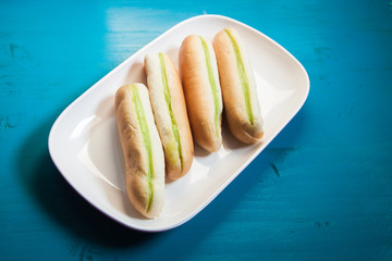 Green Custard bread Green cream cooking by banana leaf, Bread in breafast put on the white plate