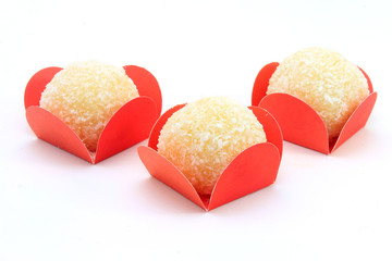 coconut kiss (beijinho de coco) - typical sweet Brazilian cuisine isolated on white background