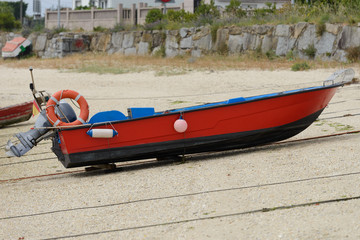 wooden fishing boat dries ashore