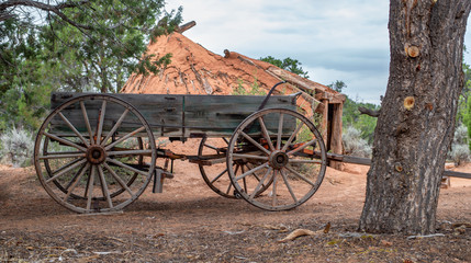 Fototapeta na wymiar Uncovered Pioneer Wagon at Navajo National Monument