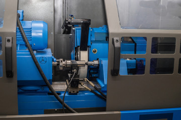 Lathe with robotic control. Machine for shaping wood, metal, or other materials,