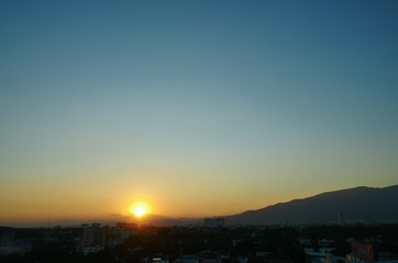 dramatic sunset sky in the city skyline