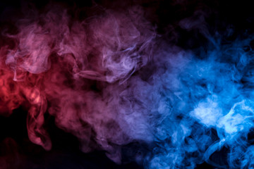 Fototapeta na wymiar Beautiful horizontal column of smoke in the neon bright light of blue pink and orange on a black background exhaled out of the vape, mocap and print for t-shirt.