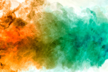 Colorful steam exhaled from the vape with a smooth transition of color molecules from yellow to blue on a white background like a collision of two jets of smoke.