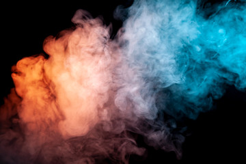 Background of orange, purple, red and blue wavy smoke on a black isolated ground. Abstract pattern of steam from vape of smoothly rising clubs. Mocap and print for t-shirt.