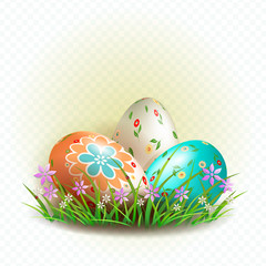 Easter composition with three eggs with a pattern, grass with flowers,