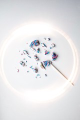 A broken Lollipop is laid out in the center on a white background.