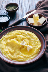 cornmeal polenta with melting butter in a bowl