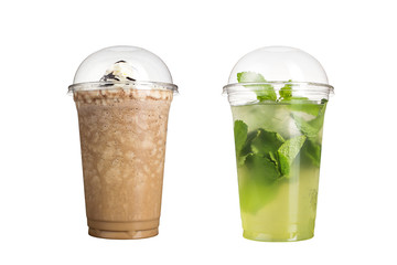 Delicious fruit smoothies in plastic cups, on a white background. Two milk cocktails and mojito.