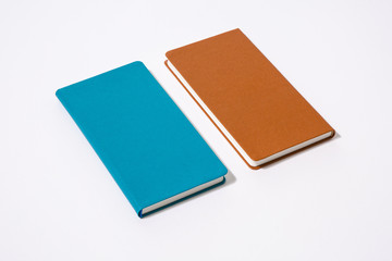 Colored leather cover notebooks.