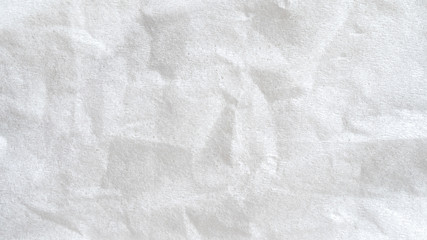 Close up white crumpled paper background.