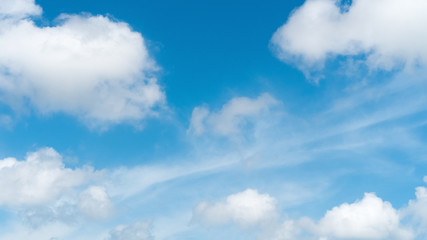 Blue sky and white clouds background.