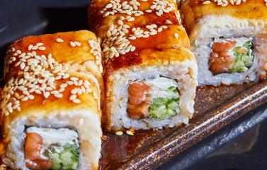 sushi roll with salmon and red caviar
