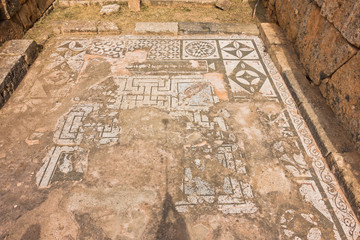 Floor decorated with mosaic ceramic tiles, architectural detail from Lissos archaeological site, south-west coast of Crete island, Greece