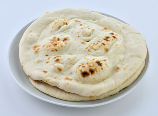 A traditional Pakistani flat bread baked in clay oven