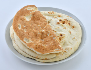 A traditional Pakistani flat bread baked in clay oven