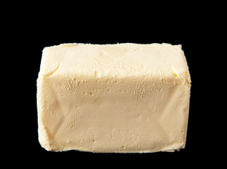 butter on black background