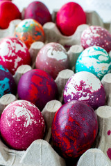 Fototapeta na wymiar Painted eggs with different colors for Easter