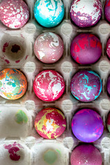 Painted eggs with different colors for Easter