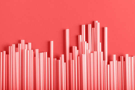 Cocktail Tubes Living Coral trend color of the year 2019 leaf art background