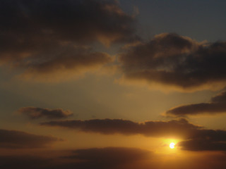 Golden light sunset view of a cloudy sky