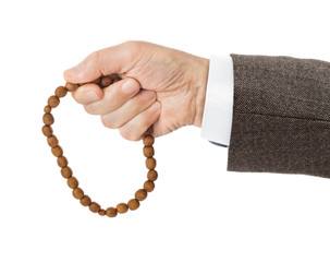 Hand with prayer beads